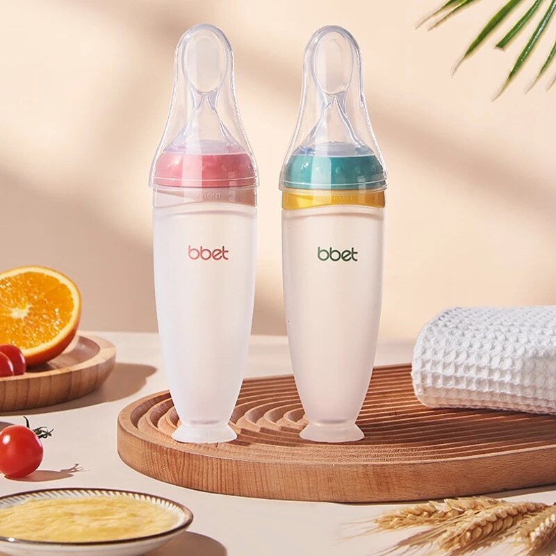 Spoon Food Squeezing Feeding Bottle Silicone Newborn Baby Training